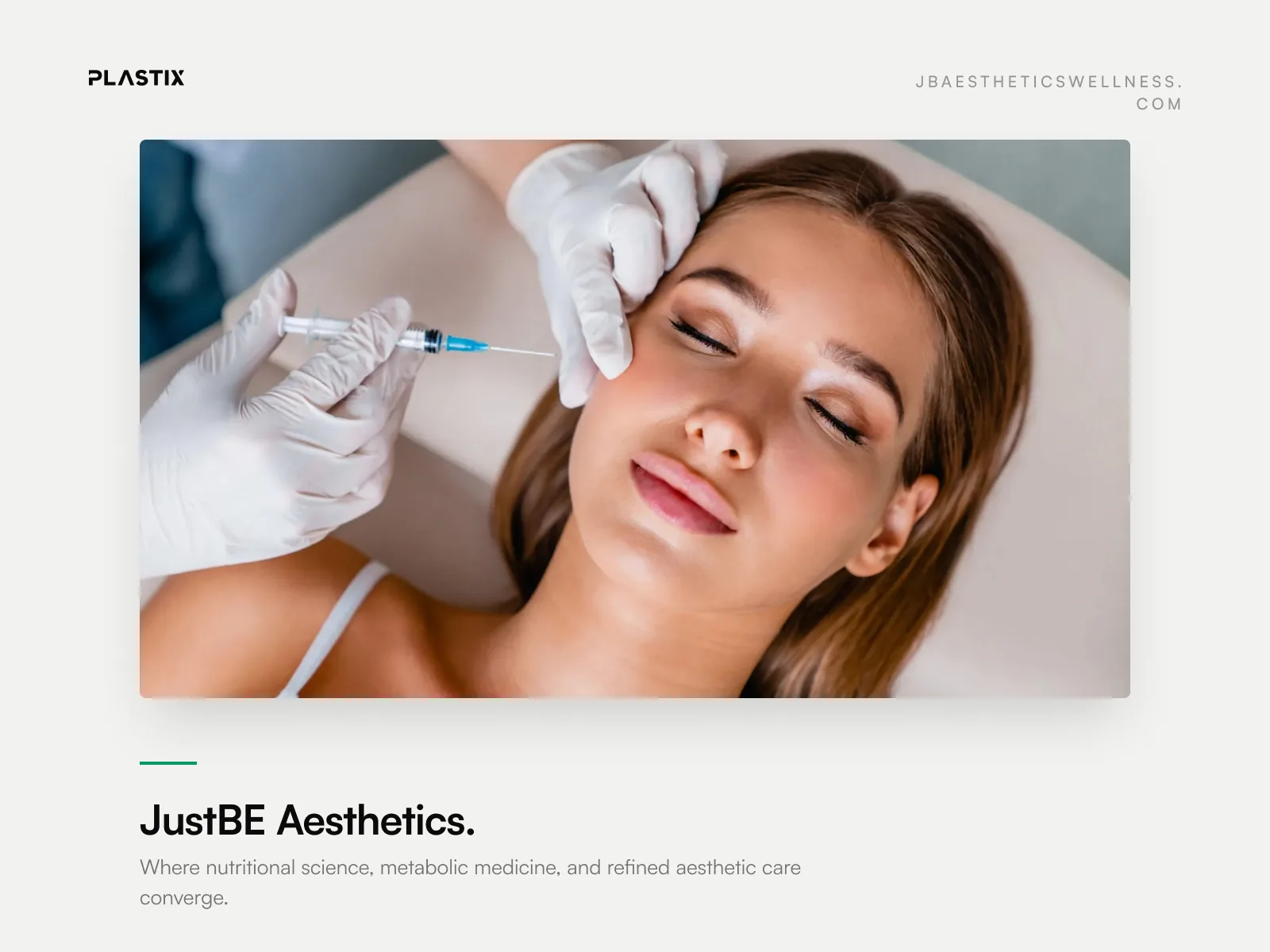 JustBE Aesthetics website design shown in an editorial gallery frame