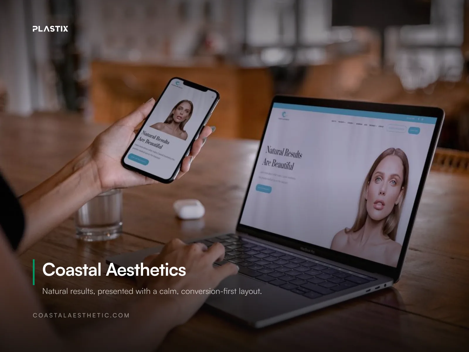 Coastal Aesthetics website shown on a laptop screen